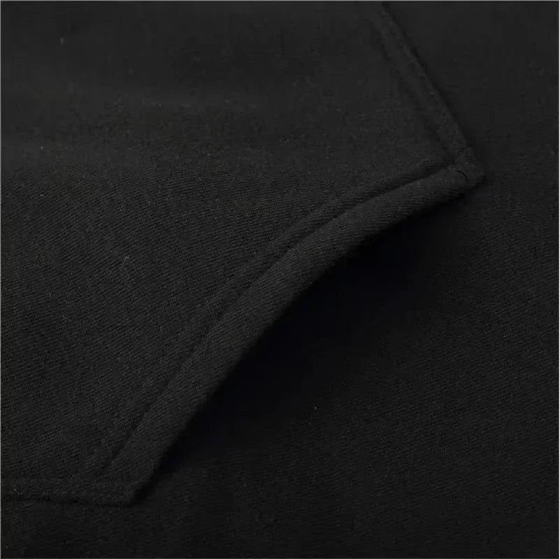 Close-up of the front pocket on the black Solo Leveling No Limit hoodie